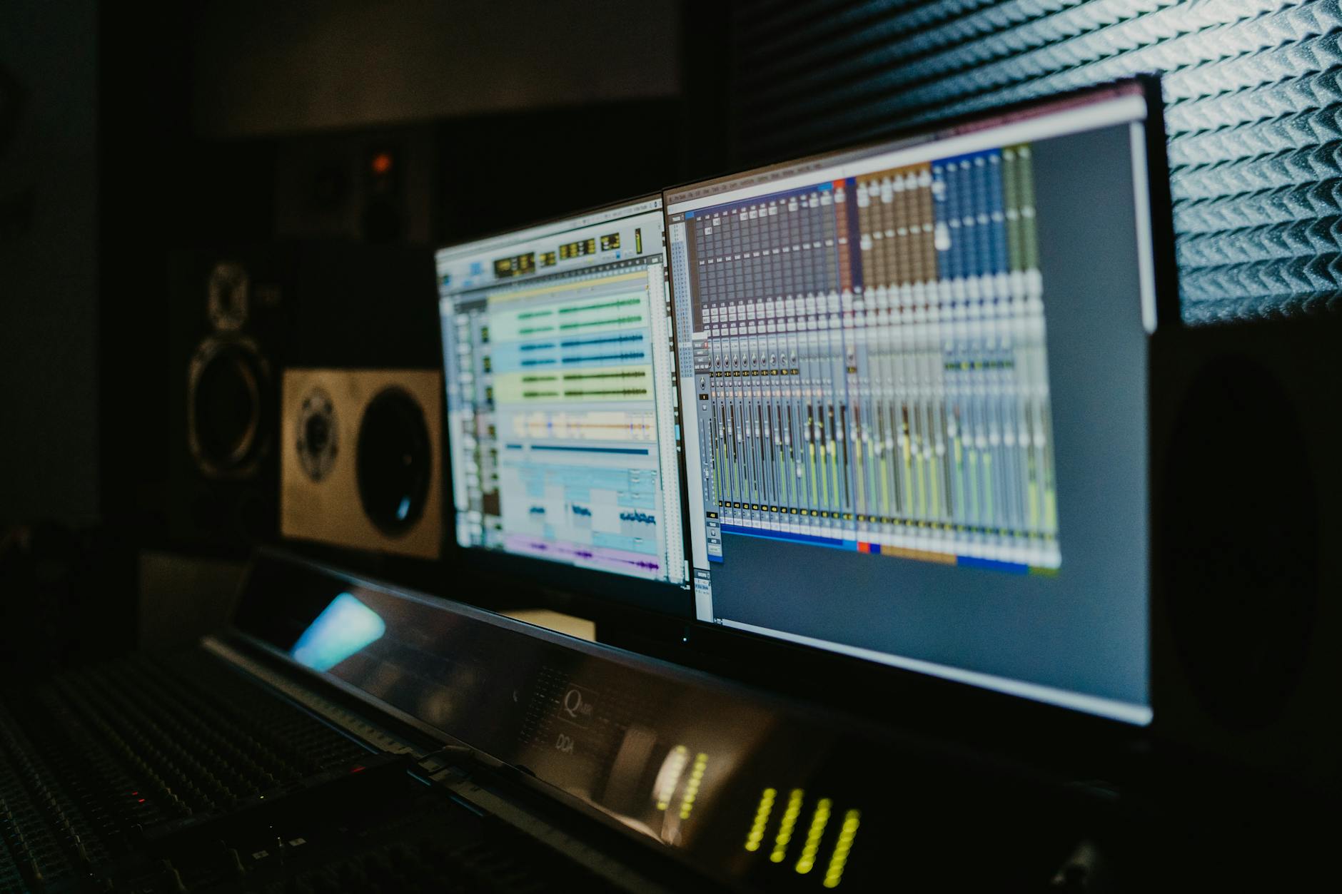 computerized monitors inside a recording studio